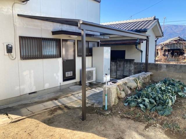 イソベトーヨー住器の山梨県市川三郷町　テラス取付けの施工例　大きなテラスは使い勝手抜群です！の施工後の写真1