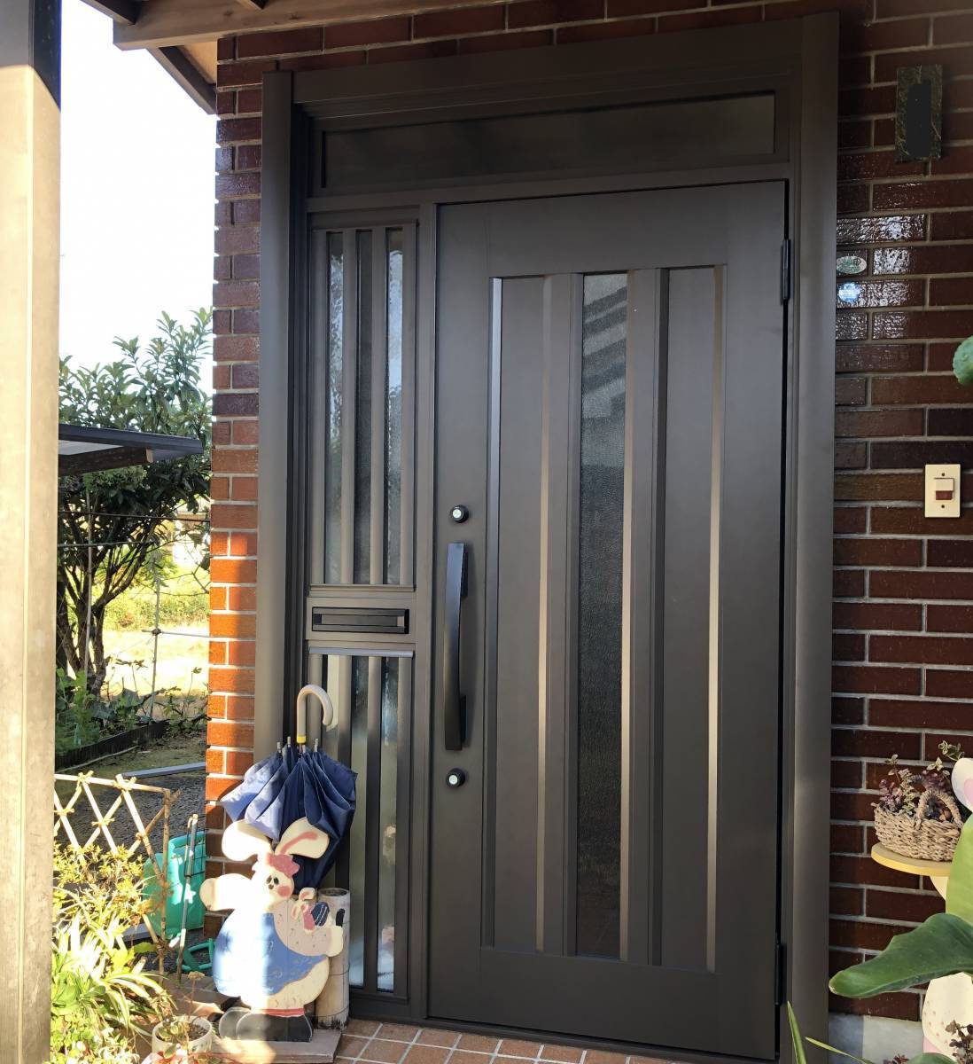 日昇トーヨー住器 鹿児島中央の玄関ドアの交換で気分も新しく！！の施工後の写真1