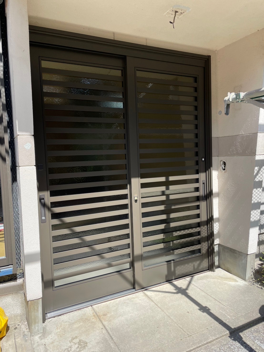 日昇トーヨー住器 鹿児島中央の玄関ドアカバー工法で取替‼の施工後の写真1