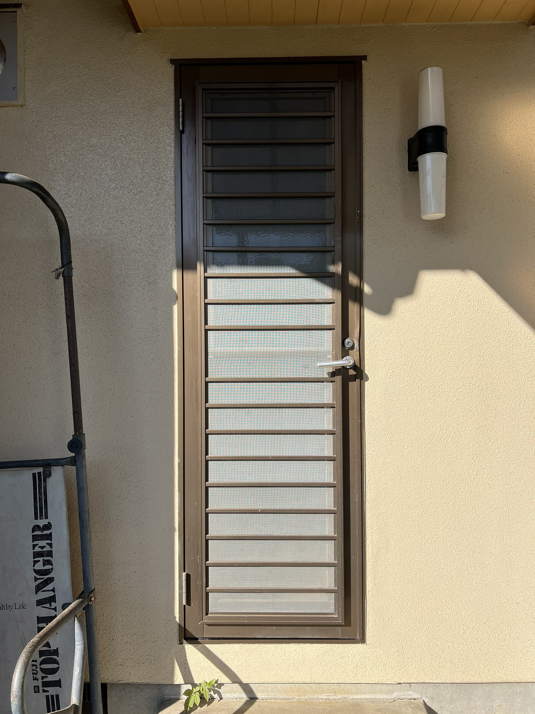 笠間トーヨー住器の城里町　勝手口ドア工事の施工前の写真1