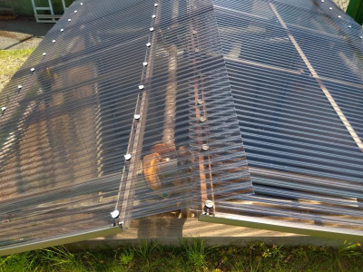 ミネトーヨー住器の【八王子市】私立大学の野球場に撒く砂置き場の屋根修繕工事の施工後の写真1