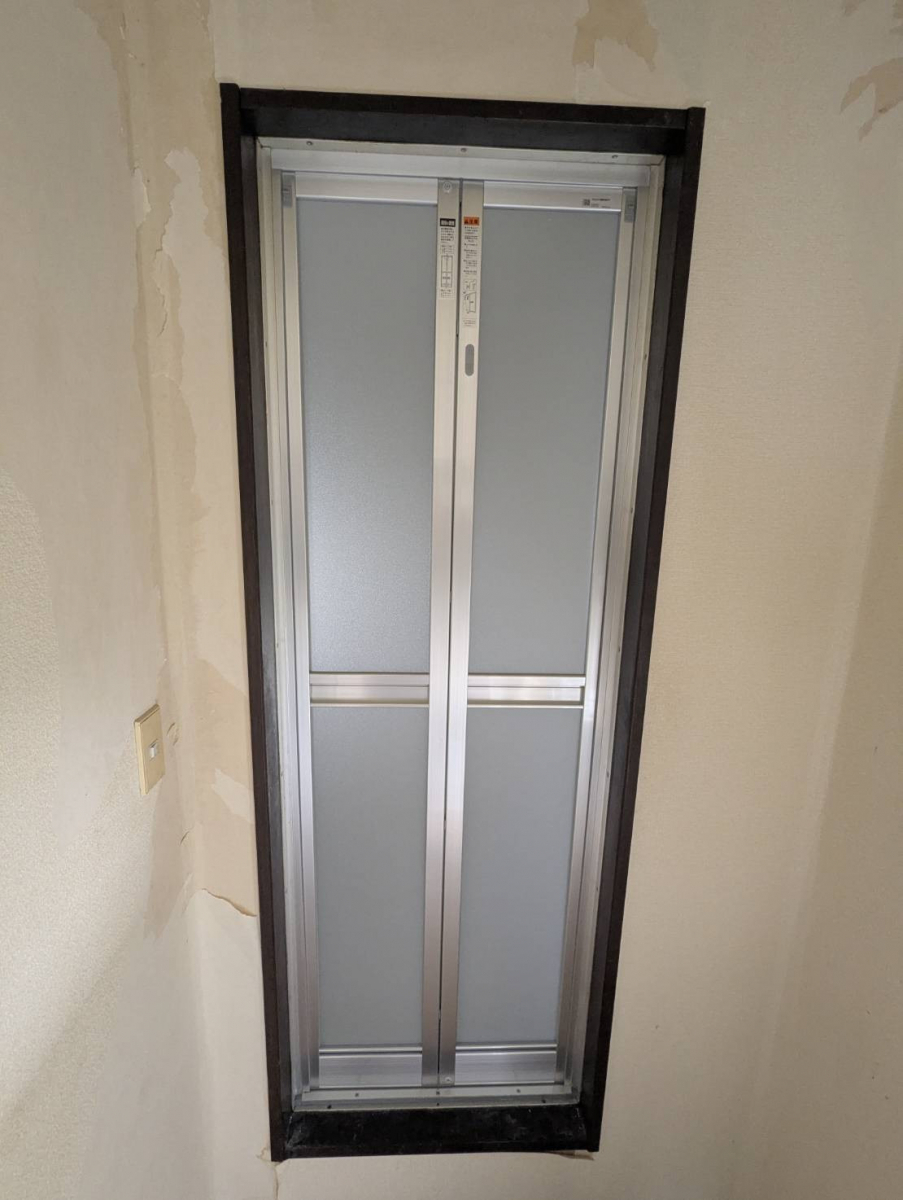 トーヨコトーヨー住器の浴室ドアリフォーム　カバー工法での施工後の写真1