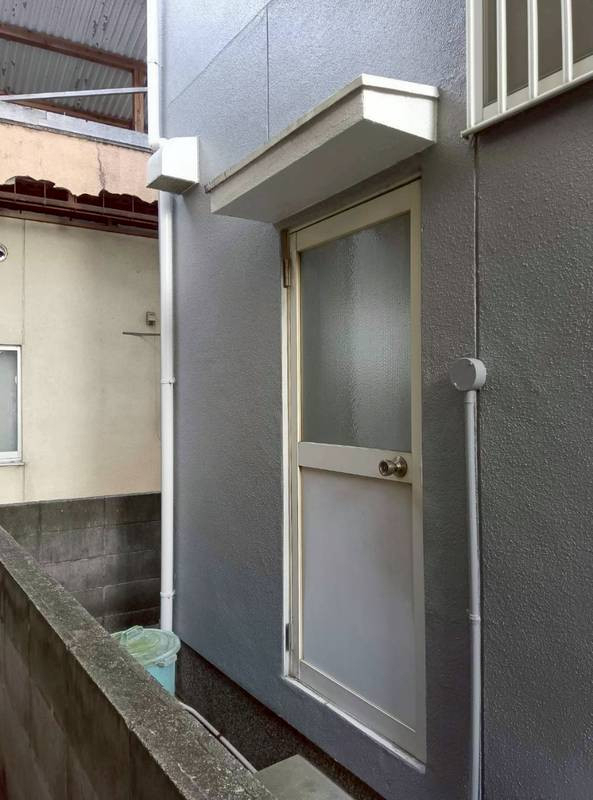 ダイワトーヨー住器の勝手口ドア入替工事の施工前の写真1