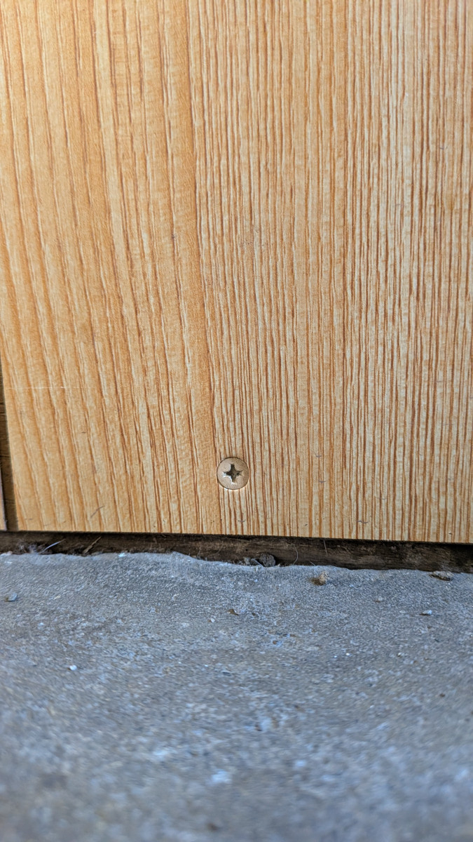 アイプラン今井ガラス建材のこんな修繕もご相談ください！玄関まわりのべニア板修繕の施工後の写真1