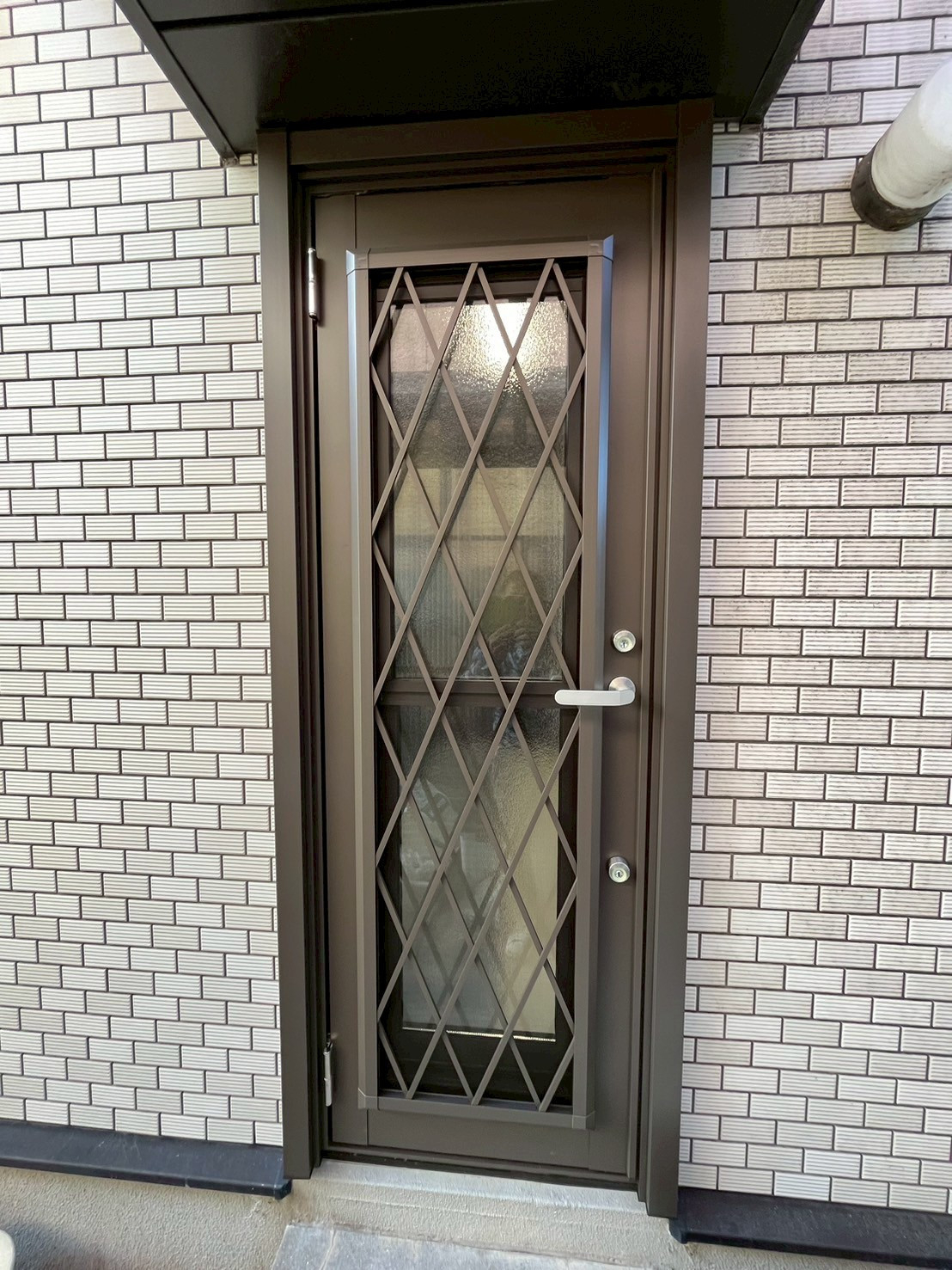 小倉トーヨー住器の【施工例】勝手口ドア取替え工事【1dayリフォーム】の施工後の写真1