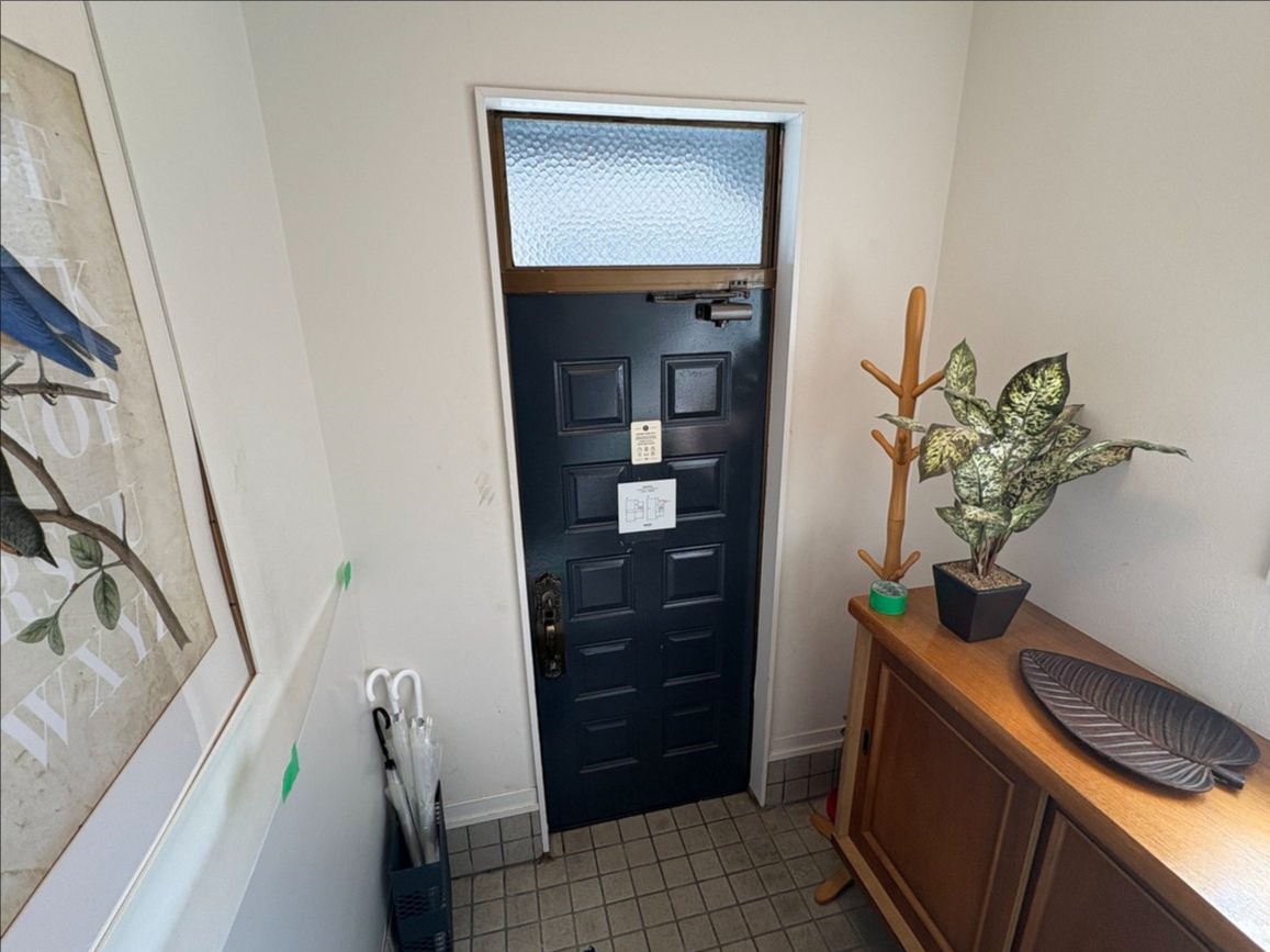 永尾硝子の玄関取替工事【リシェント】の施工前の写真2