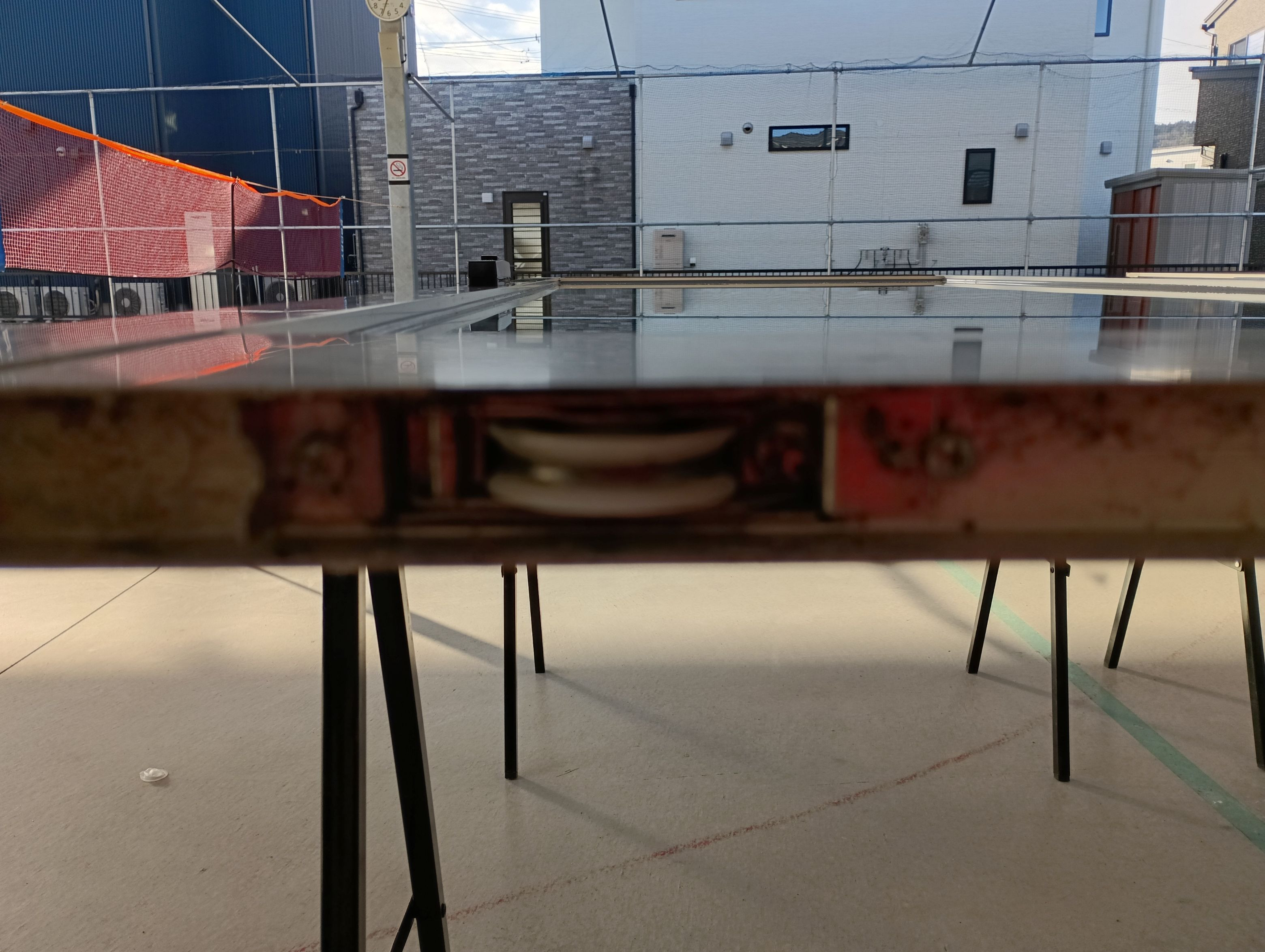 小島硝子の重くて開閉操作が困難な玄関引戸の修理。の施工前の写真2