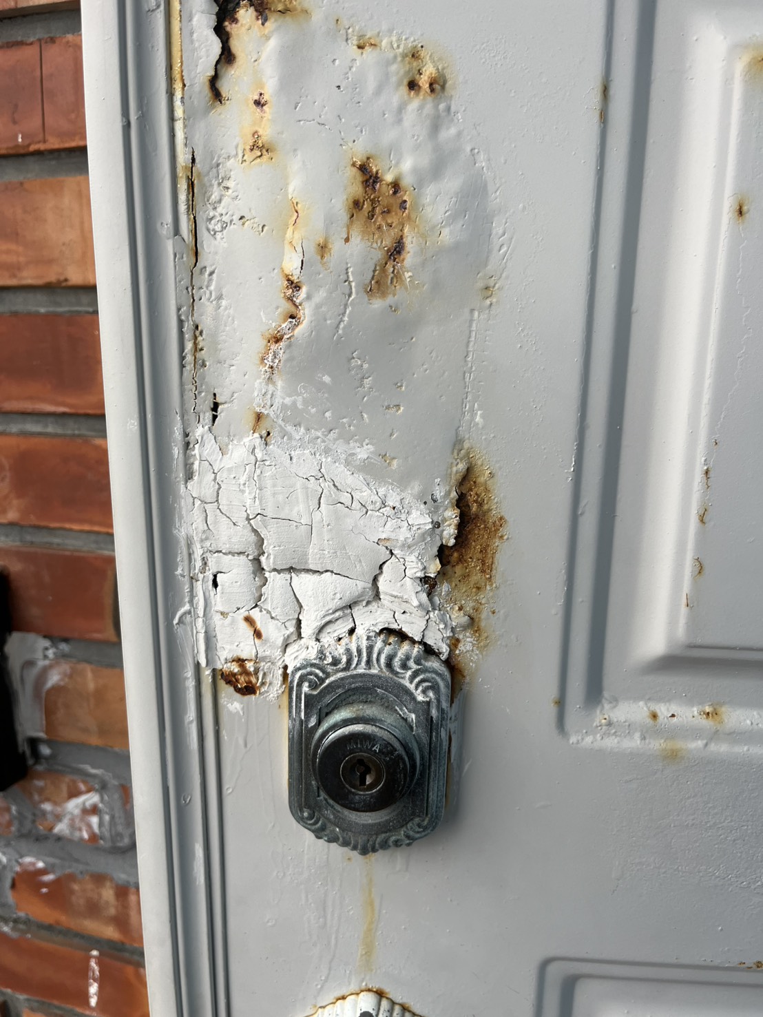 トーヨー建材の【南風原町】錆びた玄関ドアを1日でリフォーム！！の施工事例詳細写真4