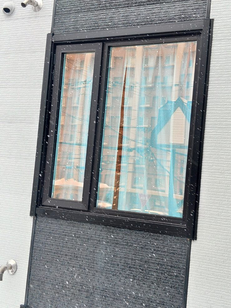 北海道アルミハウス産業の断熱サッシ取替の施工後の写真1
