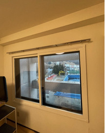 オカムラ産業の【施工例】インプラス＜引違い戸・白枠＞の施工後の写真1