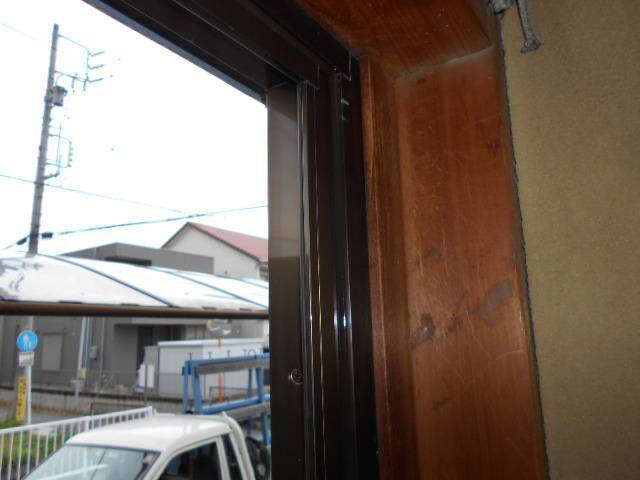 サッシセンターフジイ 名古屋西店のカバー工法にて、勝手口ドアを一新いたしました。の施工後の写真2