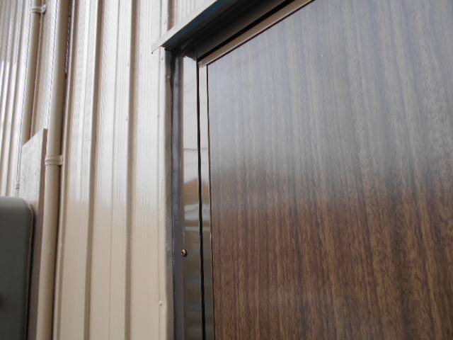 サッシセンターフジイ 名古屋西店のカバー工法にて、勝手口ドアを一新いたしました。の施工後の写真3