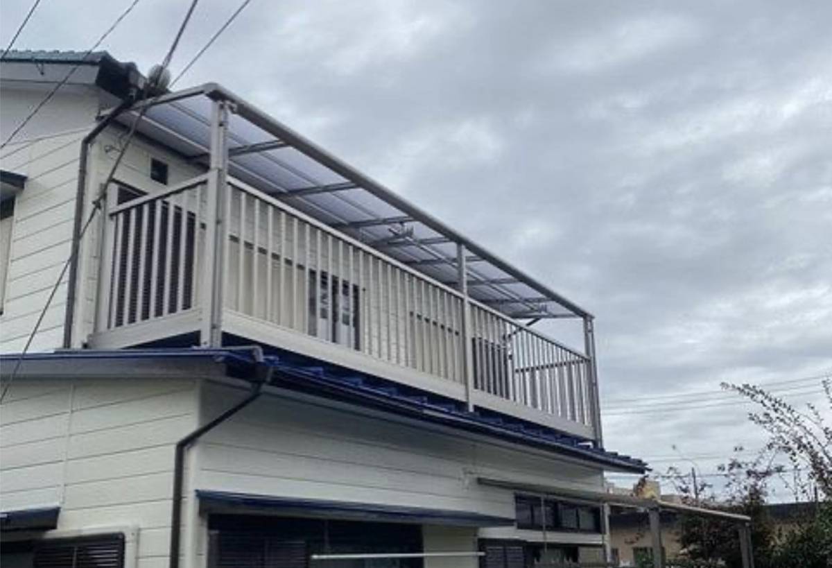 相川スリーエフのベランダ取替えとベランダの屋根取替えの施工後の写真1