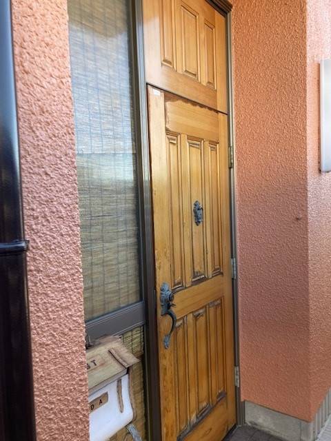 丸美の玄関ドアの交換の施工前の写真2