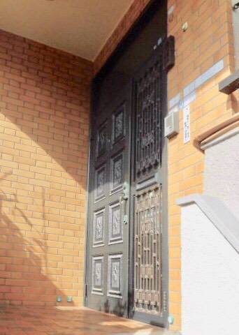 山商トーヨー住器の長崎市　玄関リフォーム　リシェント玄関ドアの施工前の写真1